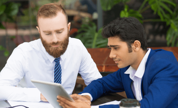 Translator assisting a customer with translation services in Millvale for success across industries.